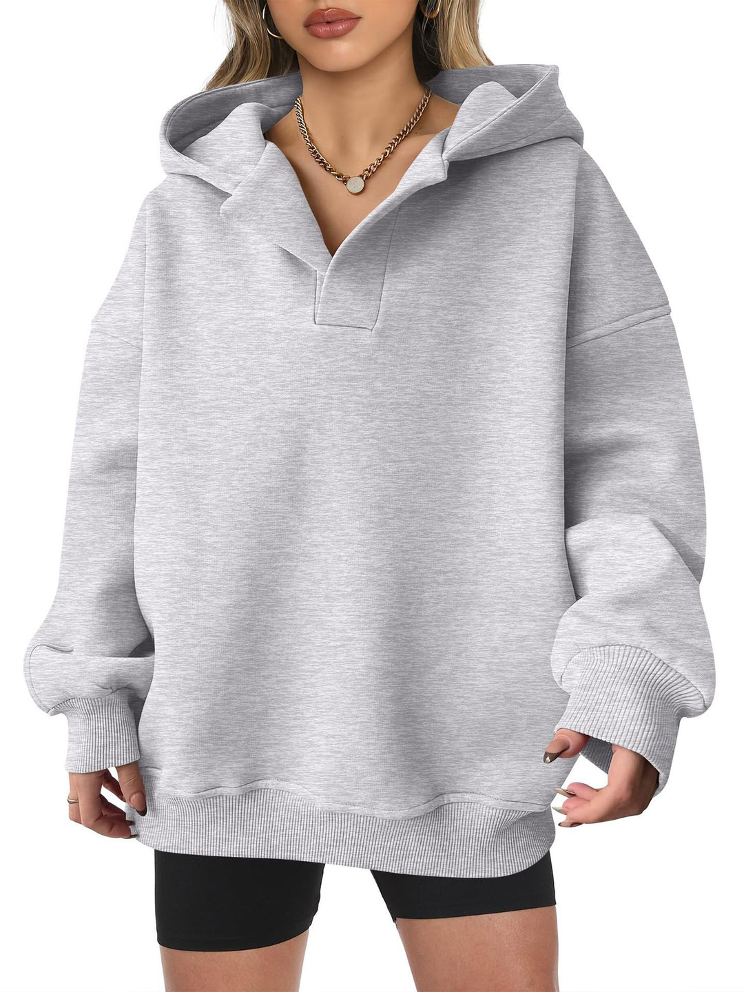 Damen Oversized Hoodie mit kurzem Kragen und praktischen Seitentaschen EB