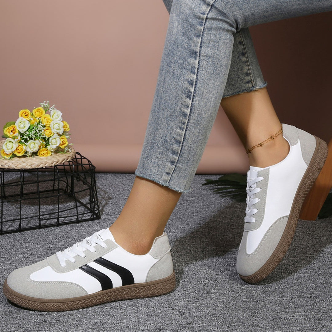 Damen Sportliche Sneakers mit trendigem Animal-Design EB