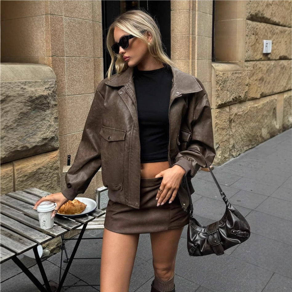 Damen Lässige und stylische Kunstlederjacke mit praktischen Taschen EB