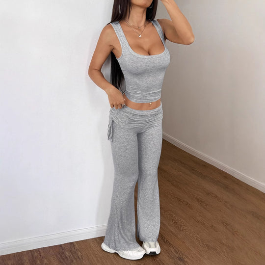 Damen Legere Sportbekleidung mit figurformendem Oberteil und weiten Hosen EB