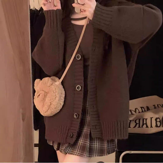 Damen Grobstrickjacke mit voluminösen Ärmeln und knöpfbarem Ausschnitt EB
