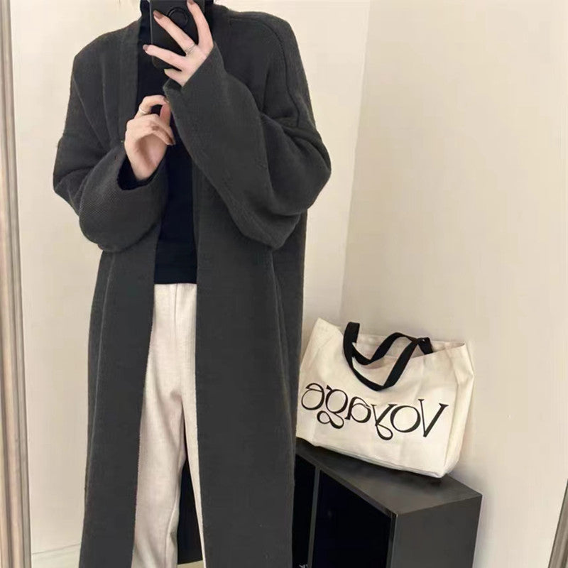 Damen Langer Wollmantel im minimalistischen Stil mit weitem Schnitt und eleganten Details EB
