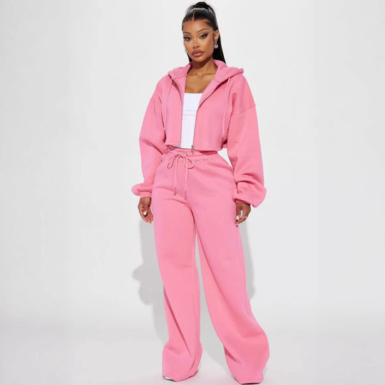 Damen gekürztes Reißverschluss-Kapuzenoberteil und hochtaillierte weite Fleece-Jogginghose Set Eichborn Berlin