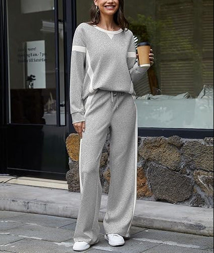 Damen nan sportives Lounge-Set mit weitem Sweatshirt, Palazzohose und seitlichen Kontraststreifen EB