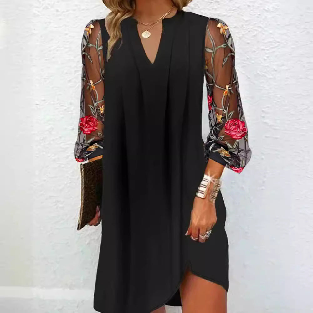 Damen Kleid mit transparenten Spitzenärmeln und floralem Design Heidi-Mode