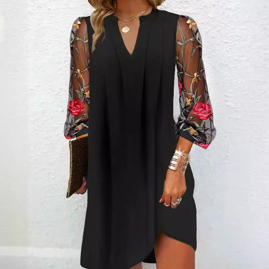 Damen Kleid mit transparenten Spitzenärmeln und floralem Design Heidi-Mode