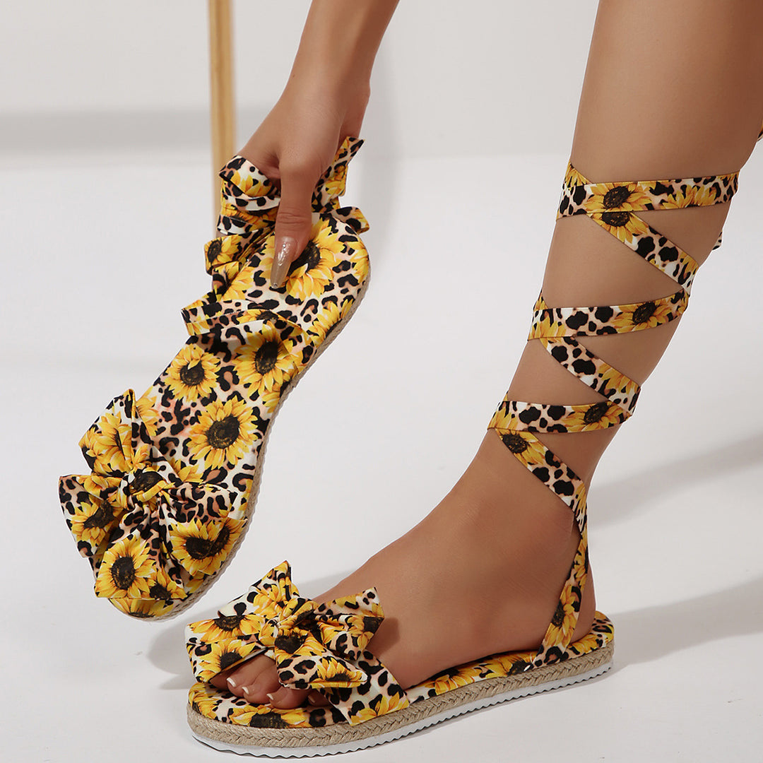 Damen Gladiator-Sandalen mit Blumendruck und Schleifenakzent EB