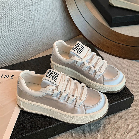Damen Elegante Sneakers mit glattem Obermaterial und breiter Sohle EB