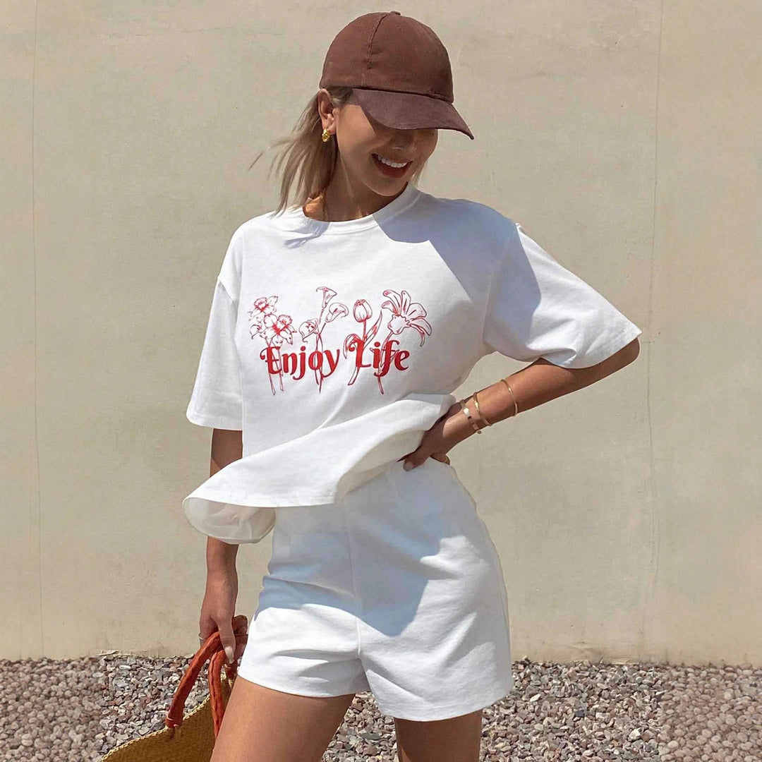 Damen Lässiges Oversize-T-Shirt mit floralem Druck und inspirierendem Schriftzug EB