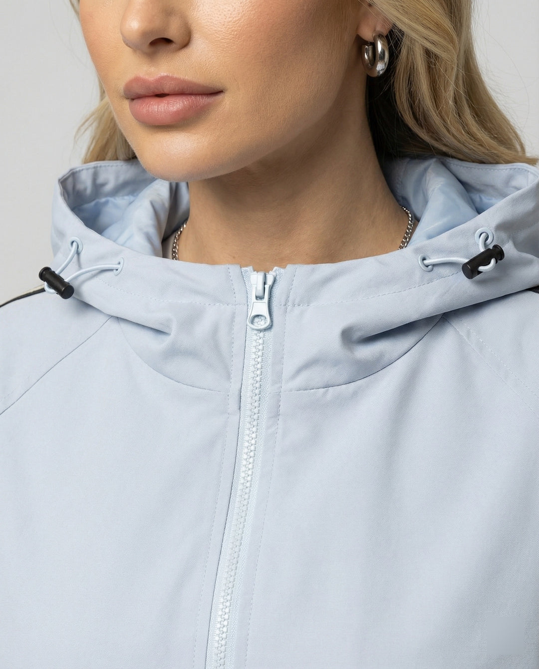 Damen leichte winddichte Kapuzenjacke im Oversize-Sportstil mit Kontraststreifen EB