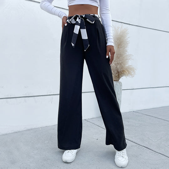 Damen weite Stoffhose mit Bindegürtel und seitlichen Taschen EB