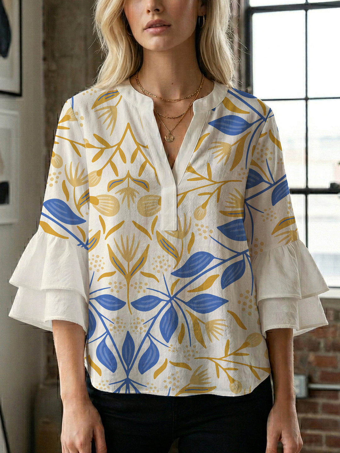Damen Bluse mit voluminösen Rüschenärmeln und floralem Druck EB