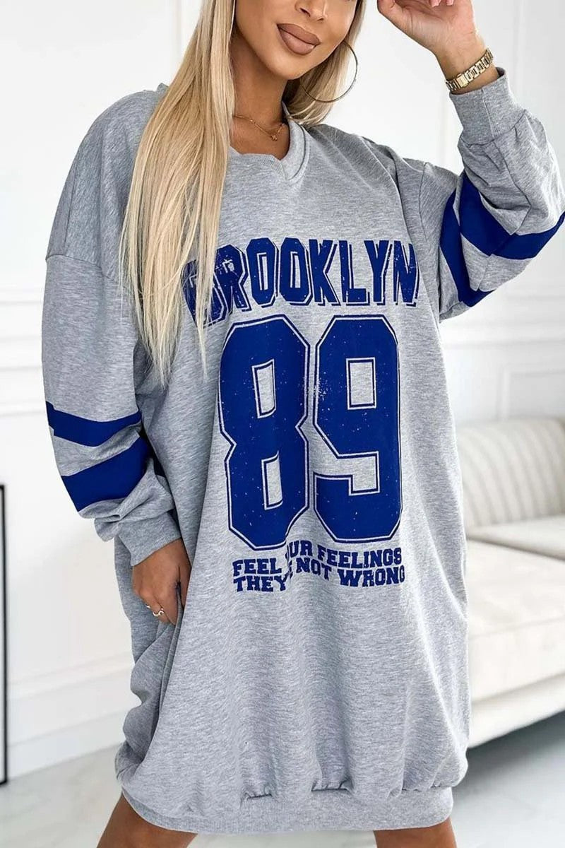 Damen lässiges oversized Sportkleid mit V-Ausschnitt und kontrastierenden Ärmeln EB