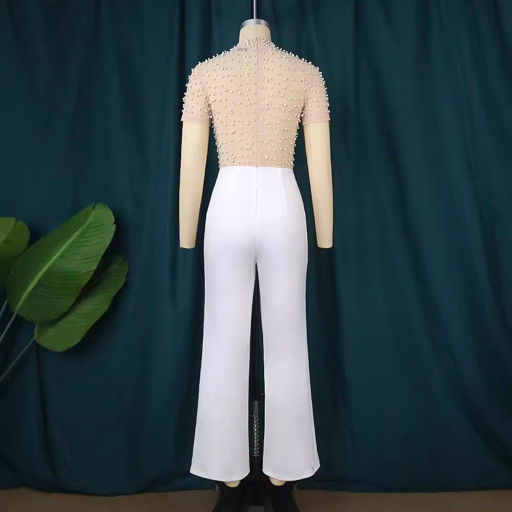 Damen eleganter Jumpsuit mit glitzernden Perlenakzenten EB