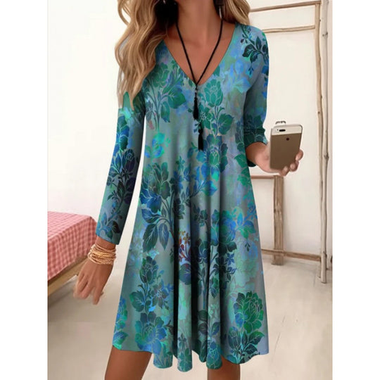 Damen V-Ausschnitt Freizeitkleid mit floraler Gestaltung und seitlichen Taschen EB