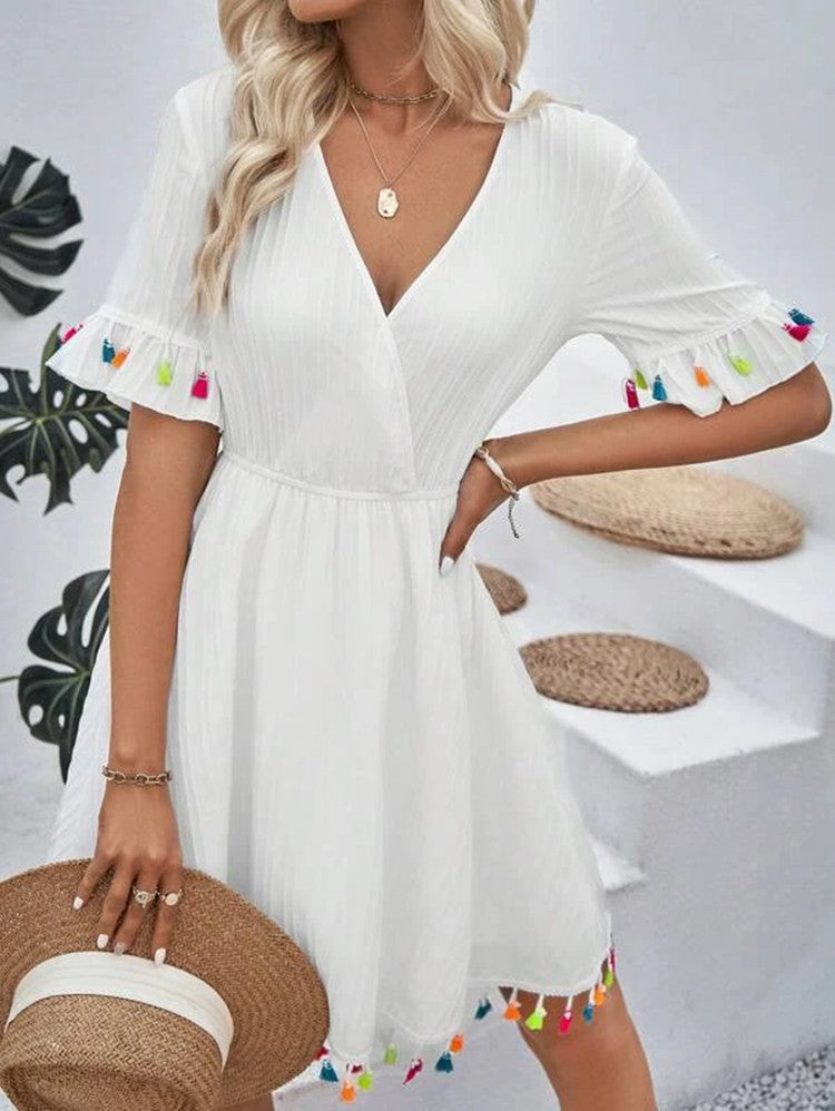 Damen Sommerkleid mit verspielten Volants und bunten Quasten EB