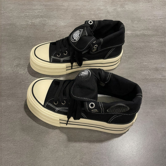 Damen Hochgeschnittene Canvas-Plateausneaker mit markanter Gummiplattform EB