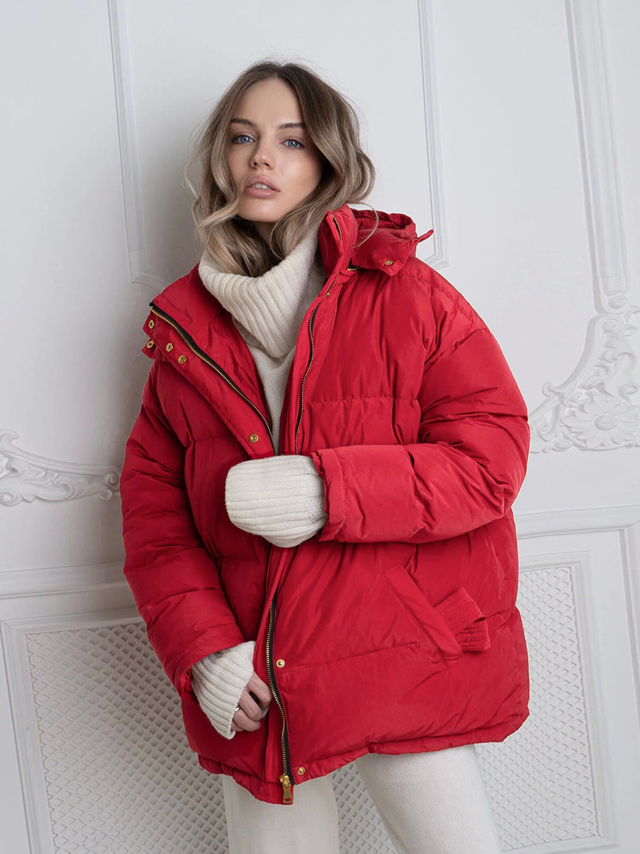 Damen Wattierte Jacke mit Kapuze und seitlichen Taschen EB