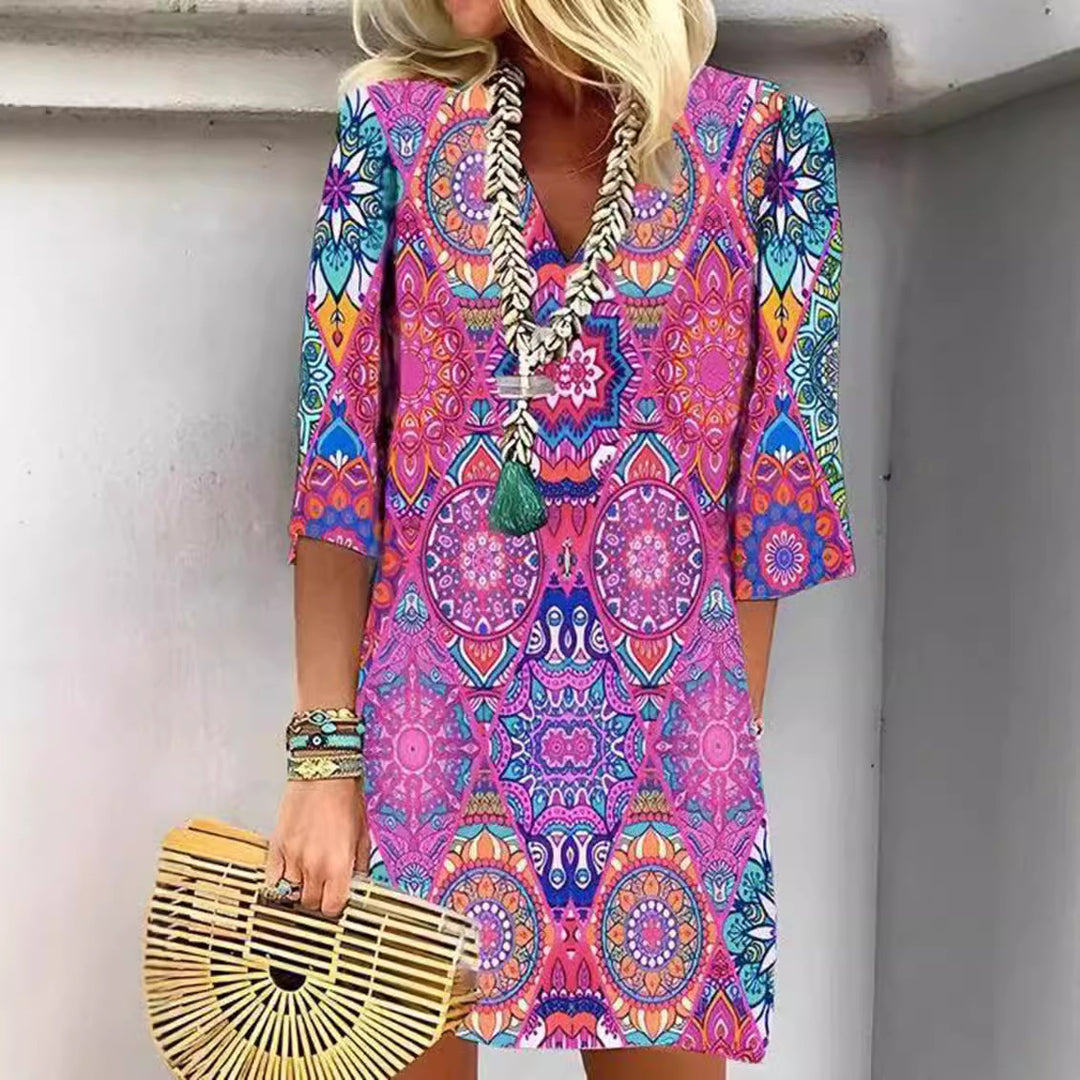 Damen Blusenkleid mit buntem mandala-inspiriertem Design und V-Ausschnitt Heidi-Mode
