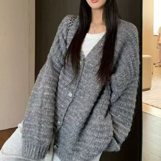 Damen Strickjacke mit voluminösen Ärmeln und einzigartiger Maschenstruktur EB