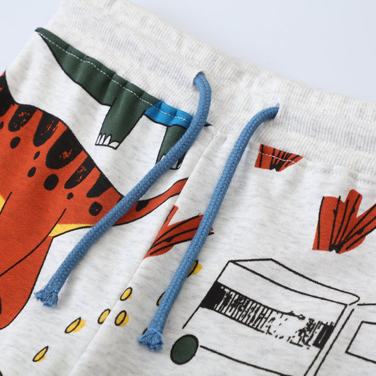 Jungen Jogginghose mit buntem Dinosaurier- und Fahrzeug-Design EB