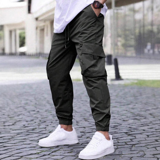 Herren nan technische Travel-Joggerhose mit integriertem Sicherheitsfach elastischem Tunnelzugbund und wasserabweisender Beschichtung EB