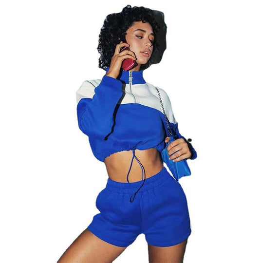 Damen modernes Sportoberteil mit kurzem Schnitt und dazu passender Shorts EB
