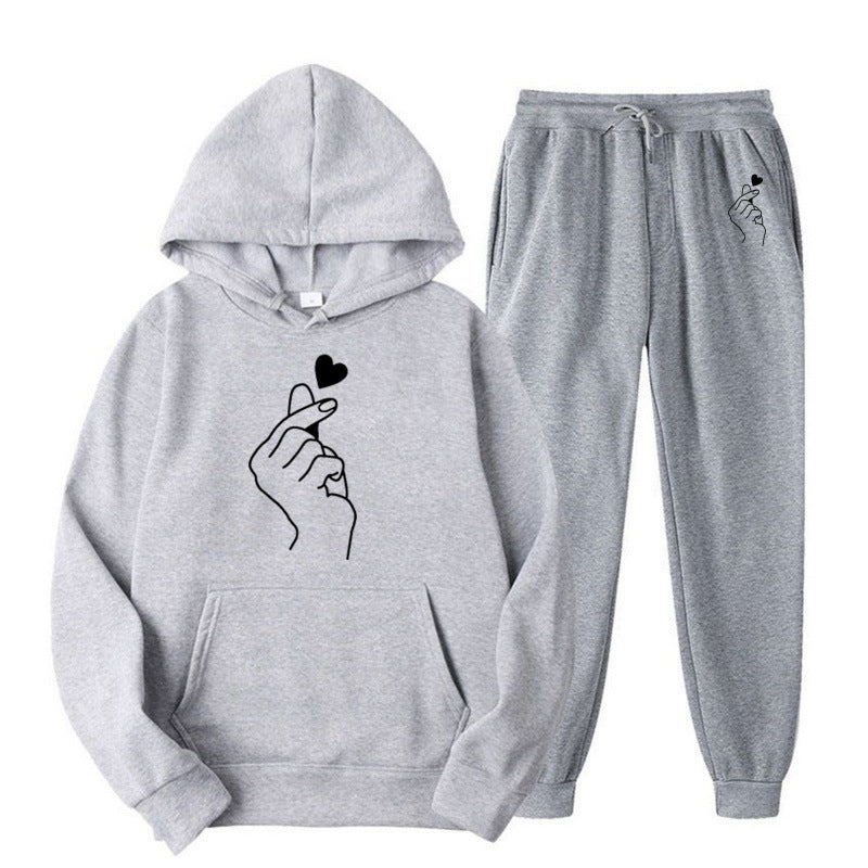 Damen Jogginganzug mit kreativem Herzmotiv und bequemer Passform EB
