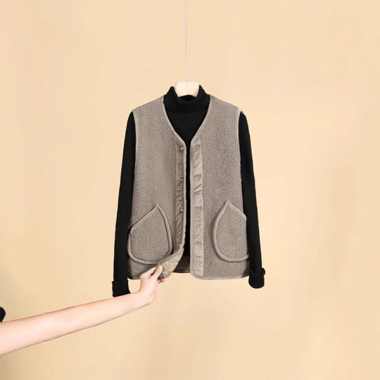 Damen Ärmellose Thermofleece-Weste mit Knopfleiste und Rundtaschen EB