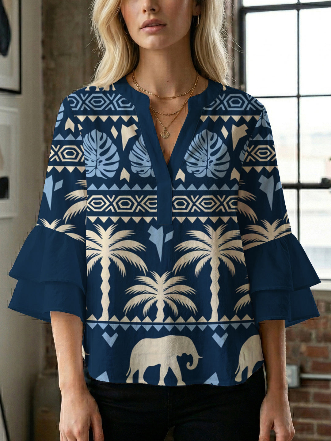 Damen Bluse mit voluminösen Rüschenärmeln und modernem Motiv EB