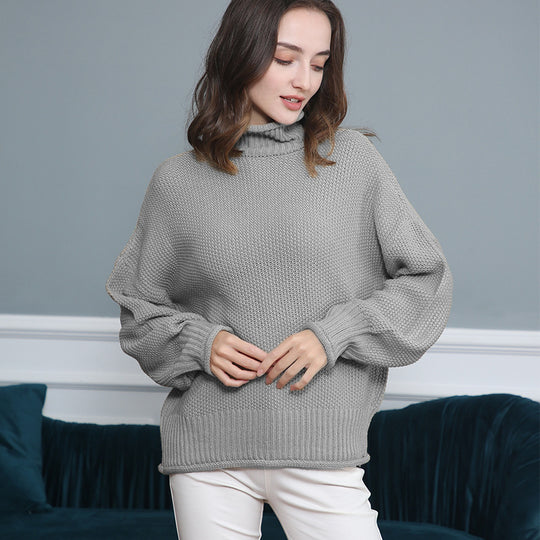 Damen Grobstrickpullover mit Rollkragen und luftiger Schnittgestaltung EB