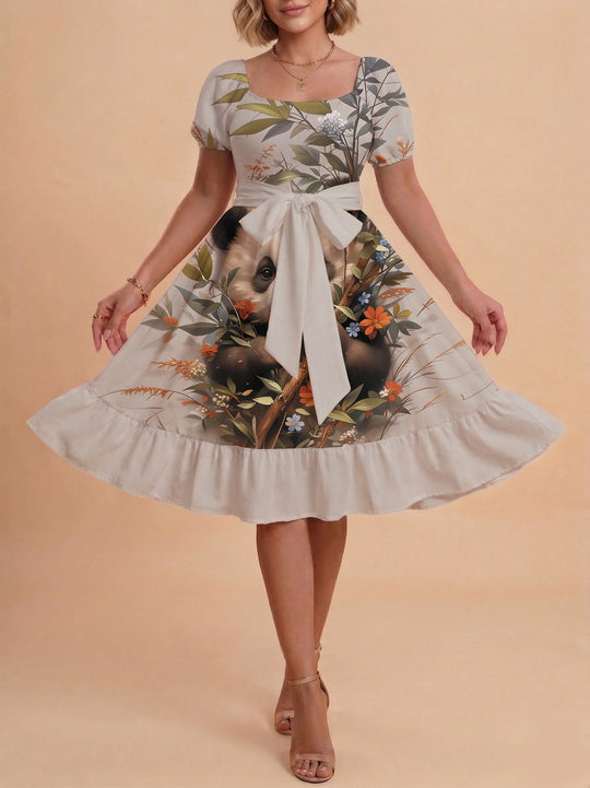 Damen Sommerliches Blumenkleid mit taillierbarem Gürtel und voluminösen Ärmeln EB