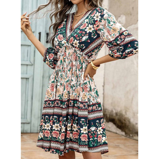 Damen Elegantes Blumenkleid mit V-Ausschnitt und elastischem Bund EB