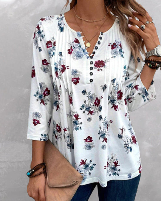 Damen Blusenshirt mit floralen Akzenten und knöpfbarem Ausschnitt Heidi-Mode