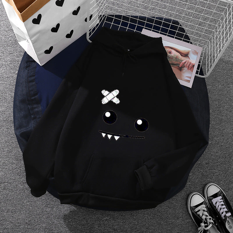 Damen nan Kapuzenpullover mit verspieltem Monstergesicht, Bandagen-Applikation und Kängurutasche EB