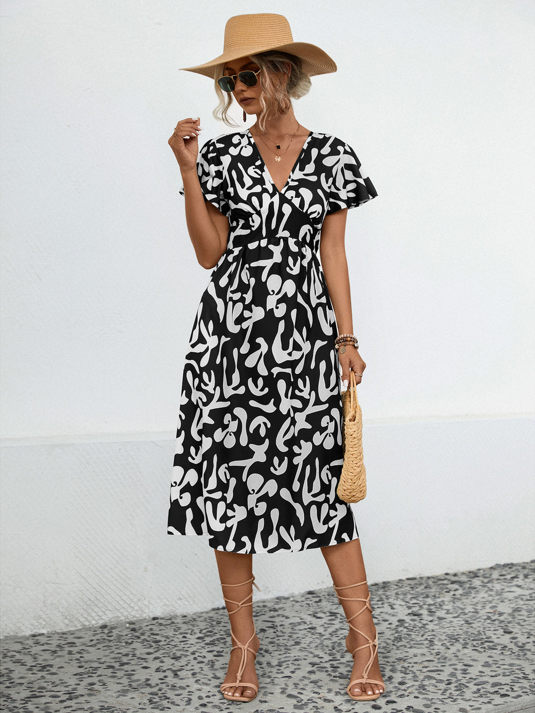 Damen Midi-Kleid mit V-Ausschnitt und fließenden Rüschendetails EB