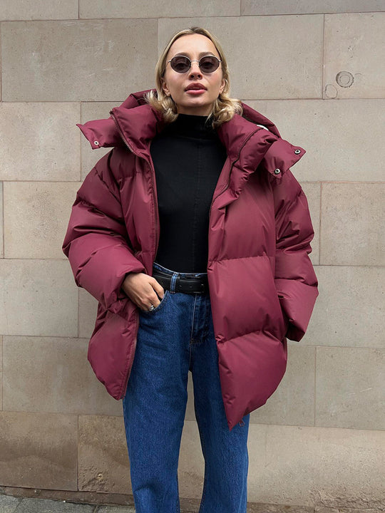 Damen sportliche Daunenjacke mit hohem Kragen und voluminösem Schnitt EB