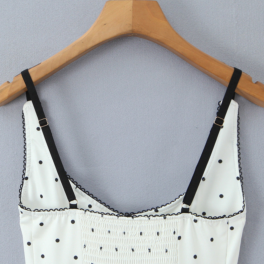 Damenoberteil mit eleganter Polka-Dot-Optik und feinen Details EB