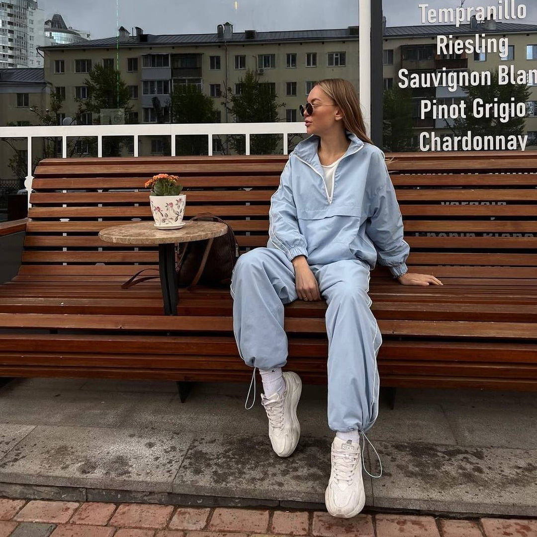 Damen winddichter Crop-Halfzip-Trainingsanzug mit elastischem Bund und kontrastierender Paspel Eichborn Berlin