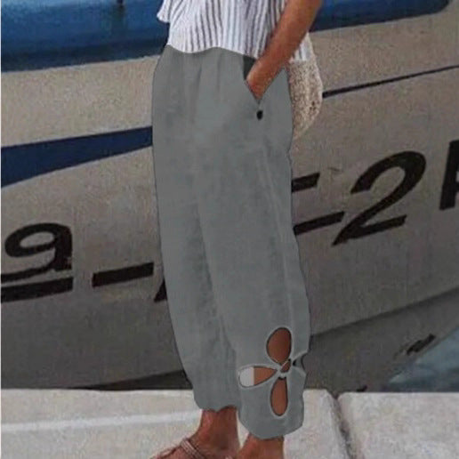 Damen nan knöchellange Culottehose mit elastischem Bund, Eingrifftaschen und floraler Saumaussparung EB