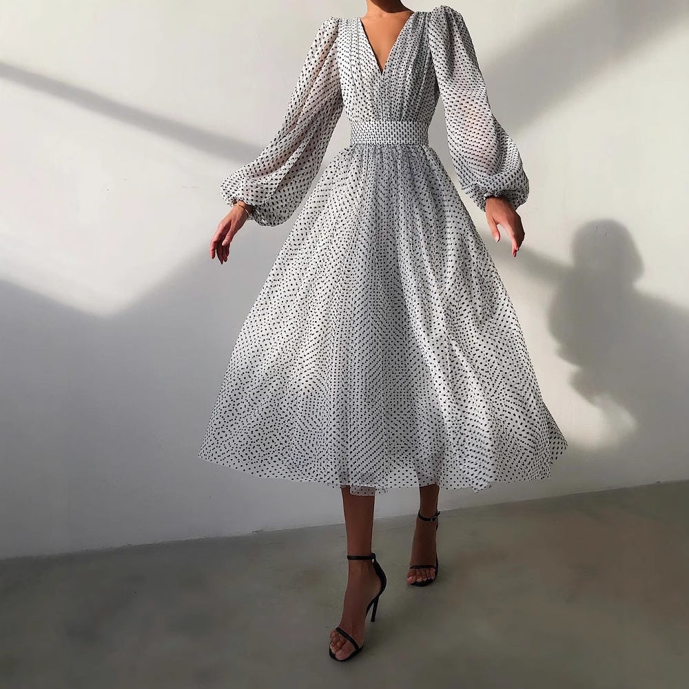 Damen Kleid mit transparentem Puffärmel und floralem Punkte-Design EB