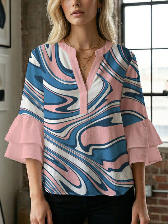 Damen Blusenshirt mit voluminösen Ärmeln und kreativem Druckdesign EB