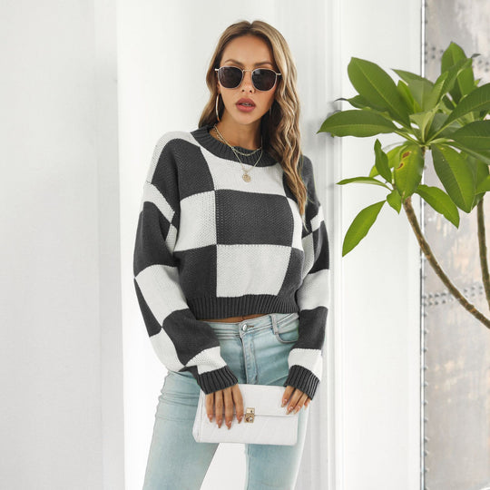 Damen Oversized Strickpullover mit modernen Karomuster und hohem Kragen EB