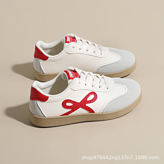 Damen Sneakers im sportlichen und eleganten Design mit rosa Akzenten EB