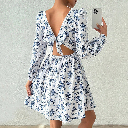 Damen florales Minikleid mit quadratischem Ausschnitt tailliertem Schößchen und langen Puffärmeln Eichborn Berlin