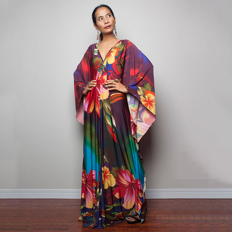 Damen Maxikleid mit kunstvollem Pfauenmuster und seitlichen Schlitzen Heidi Mode