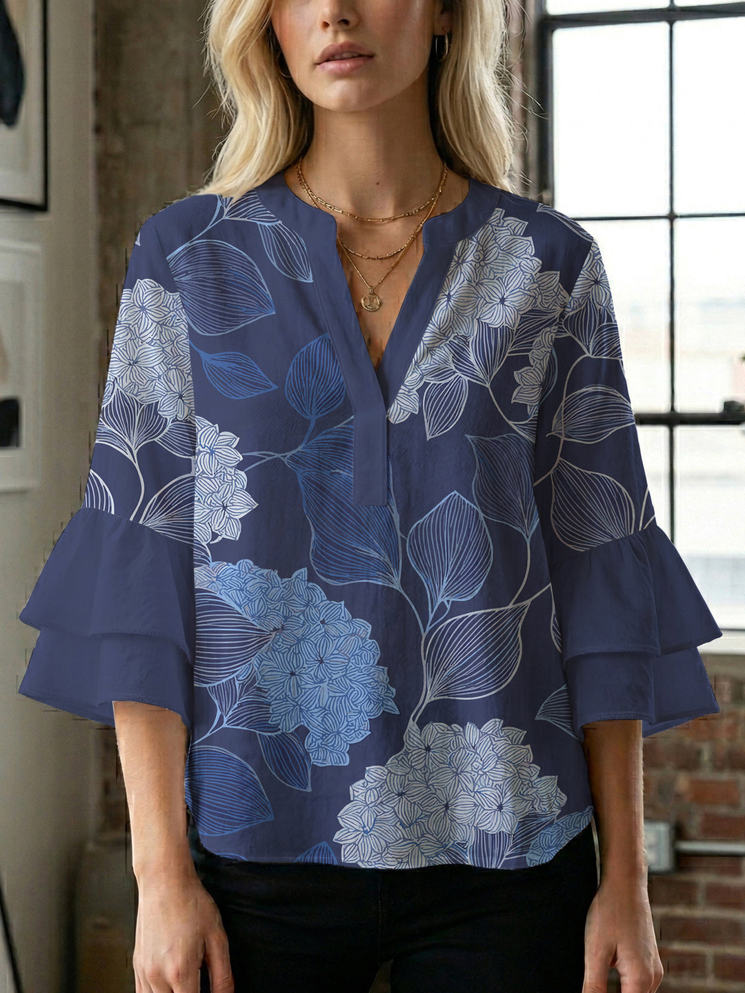 Damen Bluse mit voluminösen Ärmeln und floralem Design EB