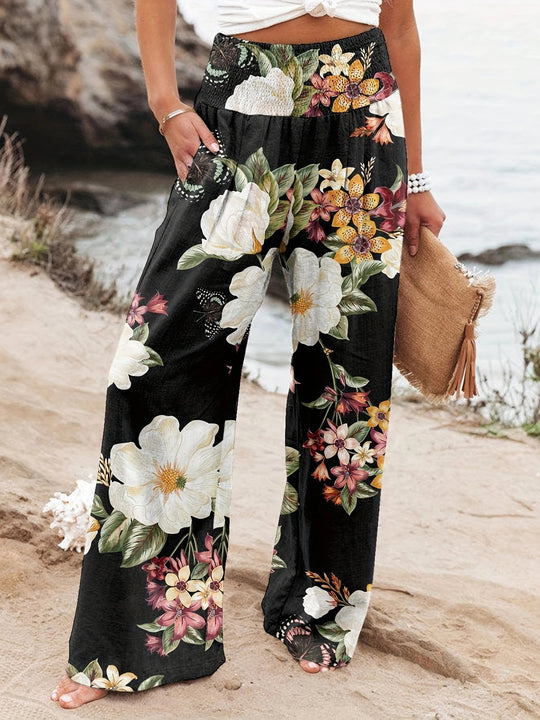 Damen Weit geschnittene Strandhose mit floralem Motiven und elastischem Bund EB