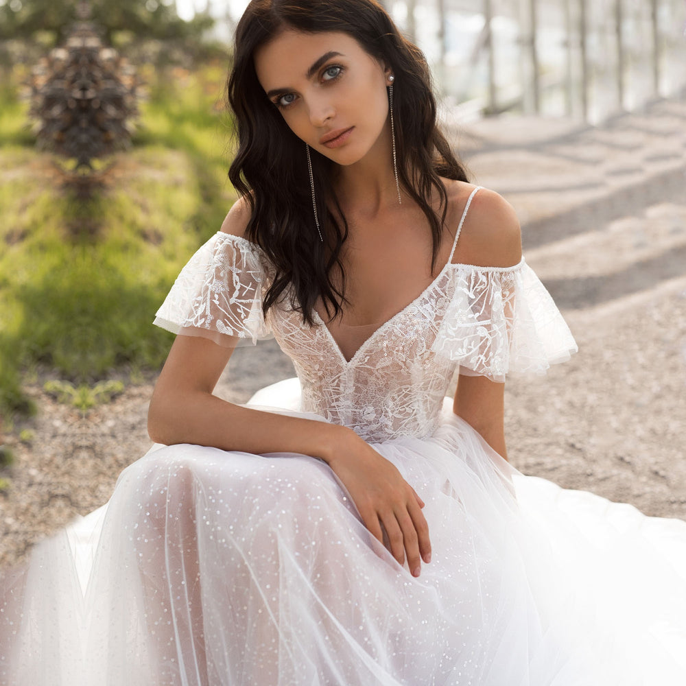 Damen Elegantes Hochzeitskleid mit transparenten Puffärmeln und glitzerndem Oberteil EB