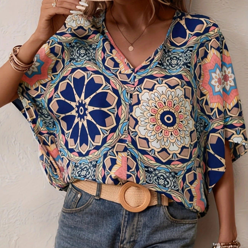 Damen Oversized Bluse mit kontrastvollem Blumenmuster EB